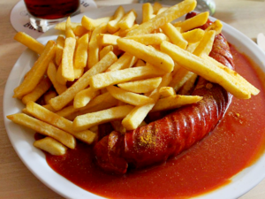 German Tomato Dishes - Currywurst.png
