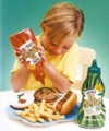 An advertisement from the time for Heinz's EZ Squirt ketchup for children.png