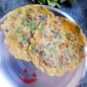 Indian Tomato Dishes - Besan Chilla.png