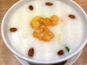 Chinese porridge with Goji Berry and fried breadstick.png
