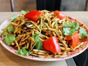 Chinese Cuisine -（折耳根炒腊肉）Zhe Er Gn Chao La Rou.png