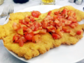 Argentinian Tomato Dishes - Milanesa with Tomatoes.png