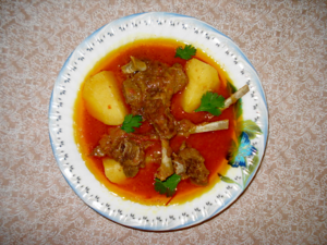 North Indian Tomato Dishes - Aloo Gosht.png